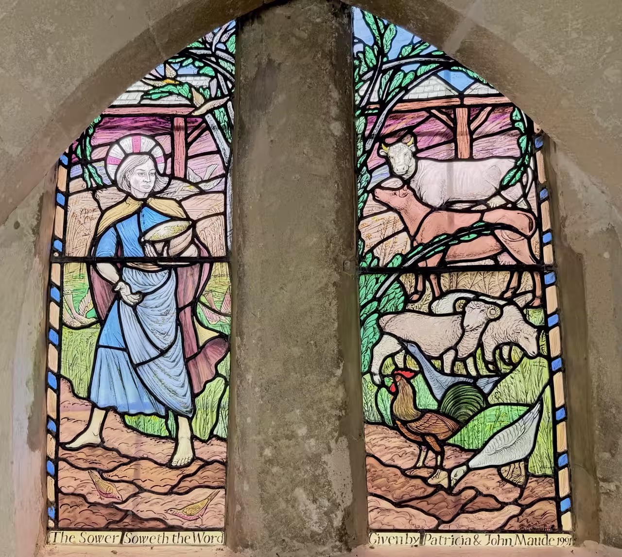 Stained glass depicting Jesus as the Sower